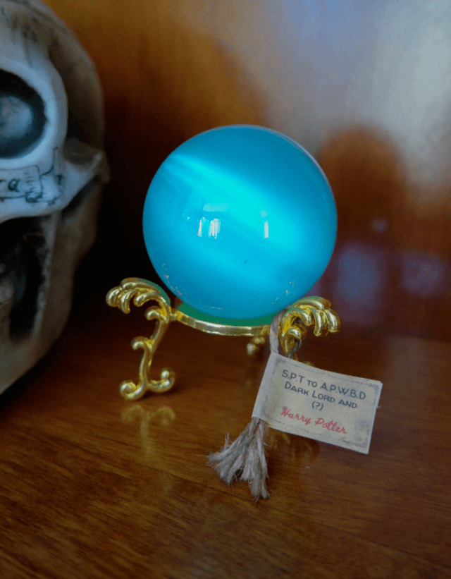 La Prophétie boule de cristal - doré ou argenté